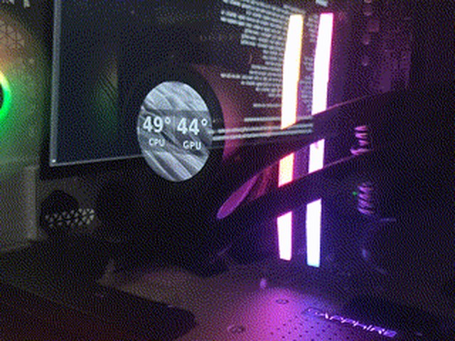 An NZXT Kraken LCD showing a GIF with CPU and GPU temperatures